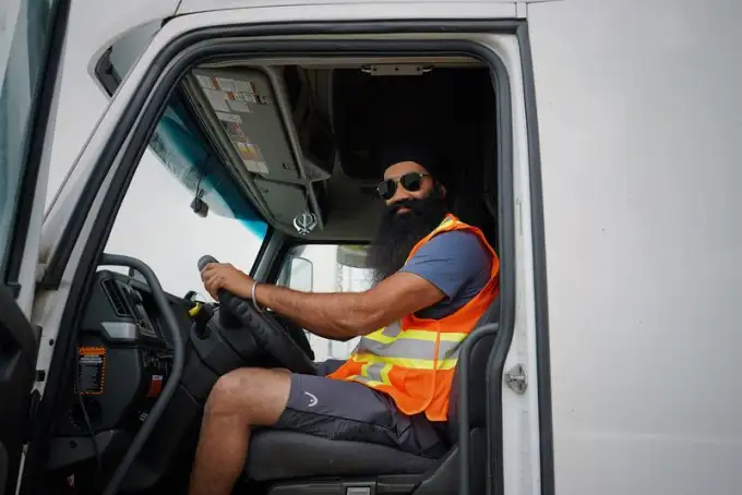 Truck driver in a Cargo Jet dispatch cab